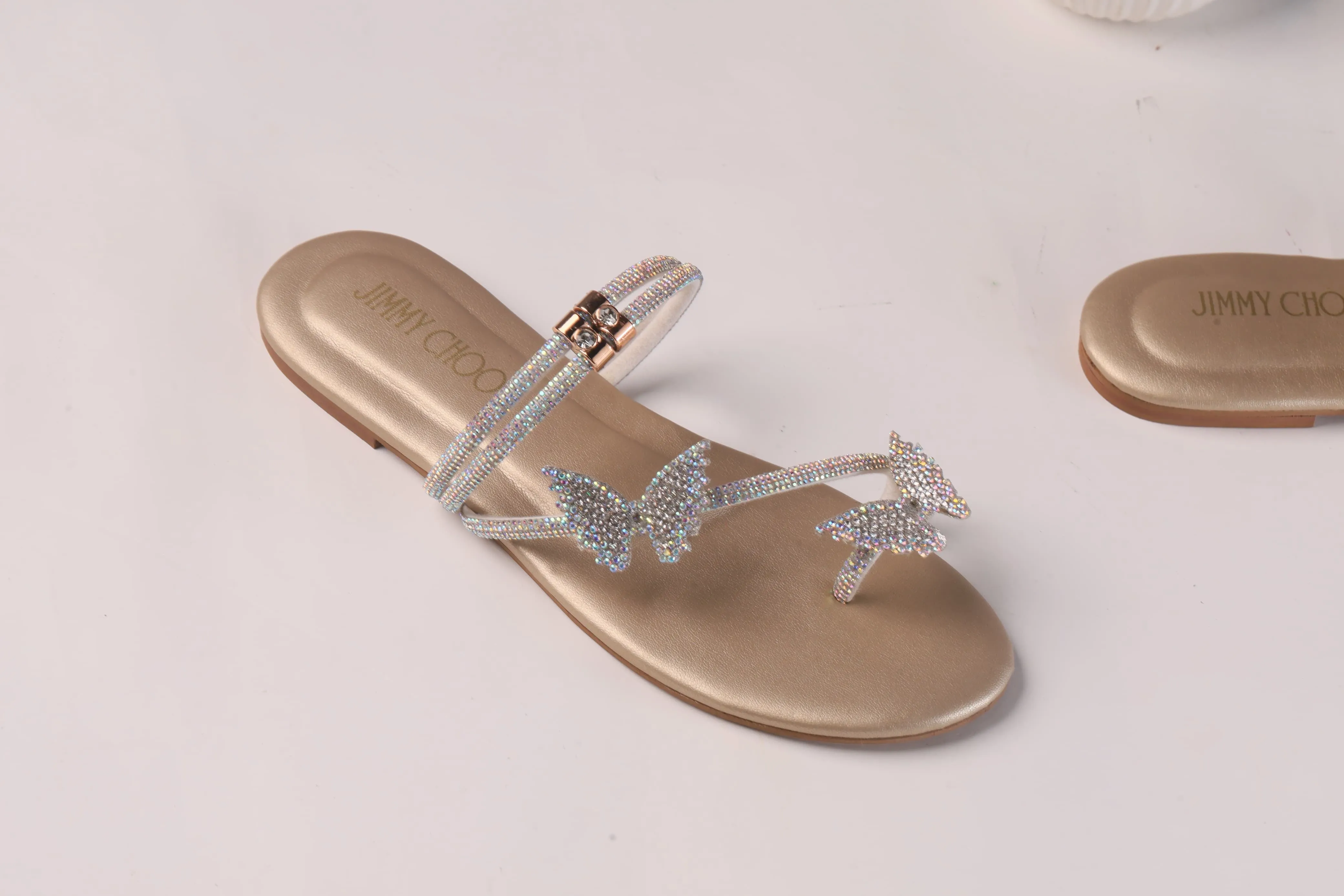 JIMMY CHOO Shinnying Rhinestone Butterfly Flat Slippers